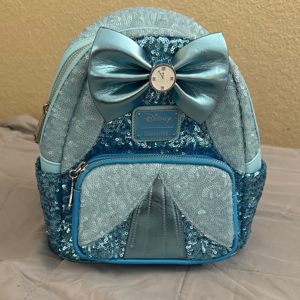 Limited edition NWT Disney Loungefly Sequin Backpack with Bow